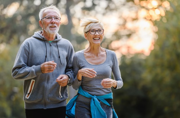 Elderly couple jog